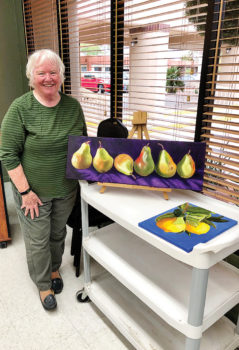 Pictured is longtime member Kathie Neffenger with her “Pears” acrylic paintings at our Share Your Art Exhibit this past January. We sure had a wonderful time sharing our art and our friendships.