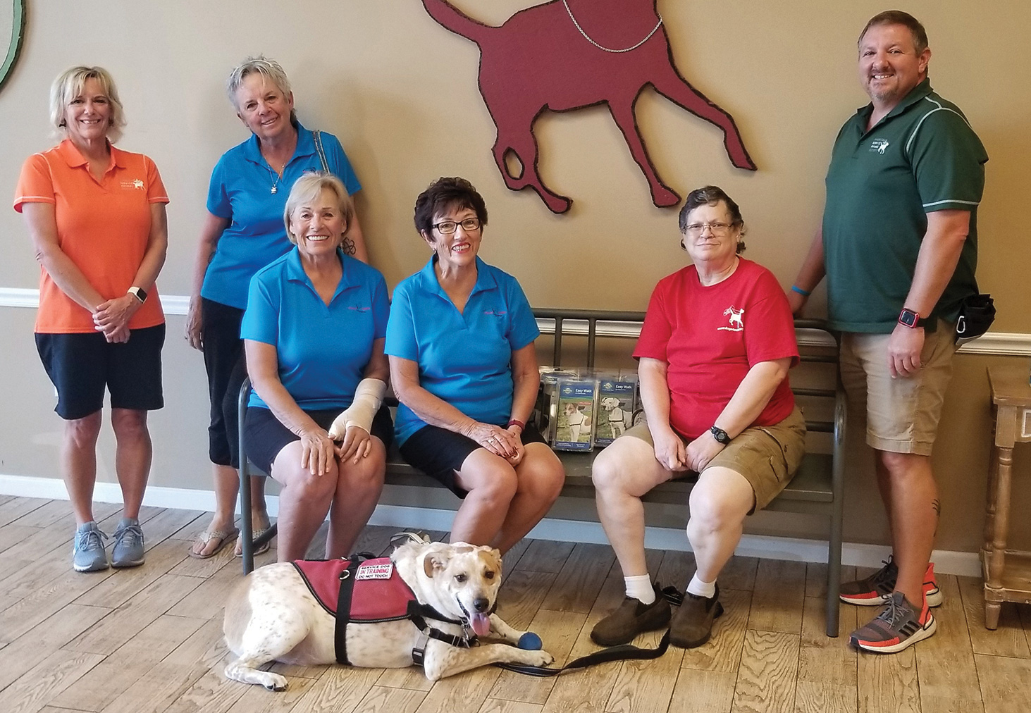 Left to right: Diane Van Compernolle, assistant trainer; committee members Val Verbeck, Mary Horn, and Judy Daidone; Sun Lakes resident Diane Holowinski and her dog Buddy; Shaun Claseman, executive director
