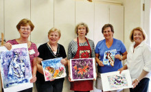 Ellie Cumberland, Judy Yaryan, Diane Hitt, Joyce Weary and Rose Sumners with their batiks.