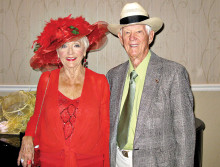 Jean and Bill Fee are ready to celebrate the Mint Julep Ball at the recent Cotillion Dance.