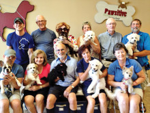 First row: Joshua Messick w/Nugget; Barbara Amstutz w/Baxter; Bob Misrach w/Hugs; Mary Erwin w/Winston; and Linda Heavin w/Sage. Second row: James Baker; Maynard Amstutz; Lucky Misrach w/Kisses; Wilma Johnson w/Sedona; Jim Heavin; and Andy Bram w/Bella. Not pictured: Joy Maschff w/Fritz.