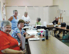 Pictured (lower left and going clockwise) Linda Shepherd, Ellie Chamberland, Lori Tronson, Sue Faraday, Irma Naumann and Bob Kwait.