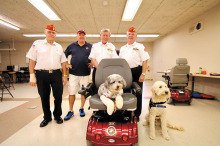 Ron Enderle, Pat Rice, Dave Althoff and Dave Minick with PowerPaws trainees.