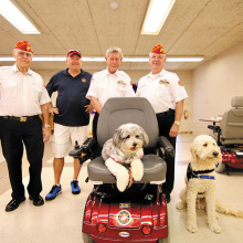 Ron Enderle, Pat Rice, Dave Althoff and Dave Minick with PowerPaws trainees.