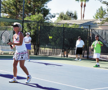 The IronOaks Tennis Club summer social included a clinic by Josh Bates and Gustavo Sanchez.