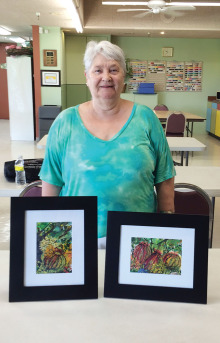 Mika Baltyn with samples of her beautiful work.