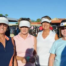 Tammy Visser, Sandy Worden, Joni Hiller and Nancy Gahn share a few moments of encouragement as they get ready to head out to their tee box.