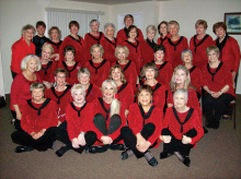 The Chordaires Show Chorus decked out for Christmas; new Director Adam Thome is standing second from the left in the back row. Come to a free performance!