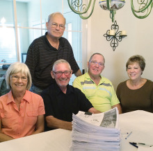 Pictures with their stack of 603 Patriot’s Pen essays to judge are left to right final judges Sharon and Terry Spahr, Tom Whittenberg, VFW Scholarship Coordinator and Bob and Sue Shields.