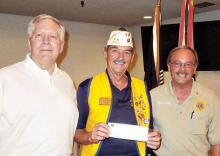 Lions Club members Gander and Sully with Commander Peer