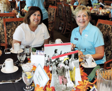 Longtime OLNGA volunteer Marcie Noble (right) and new member Denise Fleshner at the welcome back luncheon