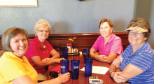 Iris Pattie, Julie Hastings, Candy Watkinson and Jean Hedberg enjoying happy hour at the Poolside Café following golf on November 4.