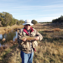 Frank Mills holding one of the 20 trout caught by members of the Sun Lakes Fly Fishing Club on a recent 3-day trip.