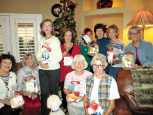 Members of the Women’s Exchange Group made holiday bags for homeless women.