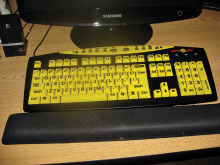 This keyboard, black with yellow keys with large black lettering is very easy to read; check out “Keys U See” online for more information. Keys are easier to see especially with those bi and tri focal. I certainly find it handy with my half glasses.