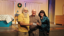 Roger Edmonds, SLCT Board member and director of Horton Hears a Who presents a check for $1,000 to Jim Fountain and Shawnna Marquis, staff members of Perry High School’s performing arts program.