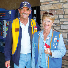 Neal Peer, Commander of Sun Lakes VFW Post 8053 and Betty Peer, President of the Post’s Auxiliary, manning one of the doors at Arizona Avenue’s Wal-Mart Store on Poppy Day, November 15.