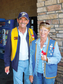 Neal Peer, Commander of Sun Lakes VFW Post 8053 and Betty Peer, President of the Post’s Auxiliary, manning one of the doors at Arizona Avenue’s Wal-Mart Store on Poppy Day, November 15.