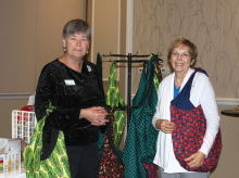 Agave Community Service Chairs Pat Johnson and Terri Austin proudly display carry bags headed for several area women’s shelters.