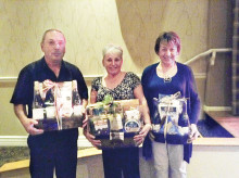 Winners of our door prizes at the January dance (left to right): Bob Smith, Betty Reagan and Ann Zangger.