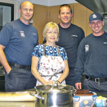 Carole Vanjes delivers a first Friday meal to shift B of Sun Lakes Fire Station Two. Firefighters enjoyed a home cooked meal without the hassle of purchasing and preparing for themselves.