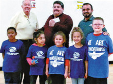 Sun Lakes Charities President Stan Scott, Ramon Elias and Chilo Figueroa with Boys and Girls Club kids