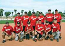 The State Farm Insurance Tournament Champions: Kneeling (left to right) Ralph Vasquez, Larry Wolfe, Larry Maggerd, Bill Cheney, Stan Weiss and Dick Bleich; standing (left to right) Roger Wisslead, Frank Tanner, Manager Gary Hatch, Owen Bae, Steve Hilby and Evan Hansen. (Photo by Sowney Pictures)