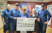 Pictured left to right are Nate Van Briesen, Brandon Johnson, Beverly Walter, Christy McClarty, 100 Club Events Manager and Andrew Craken.