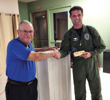 Mesa Police helicopter pilot Darren Rigsby (right) was guest speaker at the Sun Lakes Aero Club gathering March 16. Here he is shown with SLAC president Bob Walch. Photo by Gary Vacin