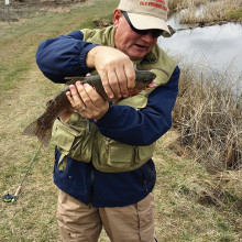 Ernie Papacek holding a nice rainbow trout that he landed at Silver Creek in March on one of our overnight trips.