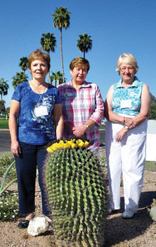 Joanne Mattern, Krys Hammers and Bert Shupe in the front garden of Chapel House