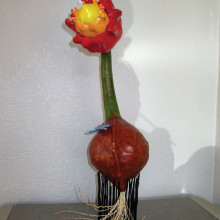 This beautiful gourd “flower” was Carl Cooper’s first endeavor in gourd art.