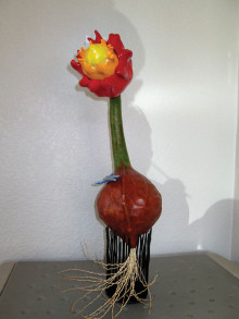 This beautiful gourd “flower” was Carl Cooper’s first endeavor in gourd art.