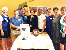 A Background of Artwork made by Arizona women prisoners was the setting March 19 for Cottonwood’s Lady Niners’ annual Member-Guest Golf Tournament which raised $7,197 for Gina’s Team. Attending from Gina’s team were (from left) Romelle Durand, Advisory Board; Diane Bondurant, Administrative Assistant; Charlene Clausen, Advisory Board; Sue Ellen Allen, Executive Director; Sandi Starr (third from right); and Diana Morgan (second from right), guest speaker. Representing Lady Niners were Karen Kishpaugh (fourth from right) and Leslie Swan, right, co-chairs of the Member Guest.