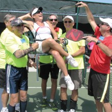 Tom Kasper, David Novikoff, Rich Nadler and David Zapatka carry Cleopatra (JoAnn Zapatka) on her throne to her next match as Mike Mann keeps her cool by fanning her with pickleball paddle fronds!
