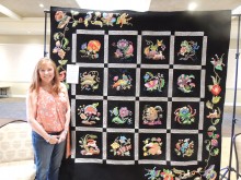 Jean NcMahon with her beautiful hand appliqued quilt; Jean is new to applique and this is her very first applique quilt. Bravo!
