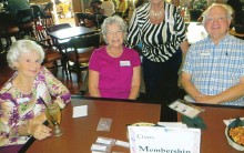 Patricia Ray (seated in the center) will greet you at the Cheers membership table on Thursdays!
