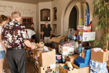 About 25 Risen Savior members gathered to box and move 2.4 tons of donated food from the front of the sanctuary to the entrance of the church for pickup by the Chandler Food Bank. Most of those present were also Sun Lakes residents.