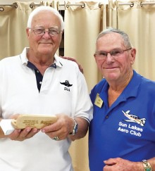 Dick Stich (left) of the Falcon Warbirds formation flying team was guest speaker at the Sun Lakes Aero Club gathering April 20. Here he is shown with Bob Walch, club President.
