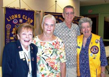 Lion Sally Hanson, who inducted Joan and James Loose into the club and Lion Pat Hollander, sponsor of these new members.