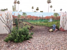 Marilyn Conner painted this mural on her fence and can now enjoy spring all year long!