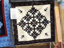 This small quilt made by Dianne Stoutenberg is from star quilter Kathie Neffenger’s Mexican Star piecing workshop. Come join us in the fall.