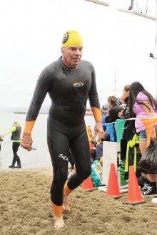 Sun Lakes resident Gary Sanford steps out of the water after completing the 1.5 mile swim from Alcatraz Island to the San Francisco Bay shore August 8.