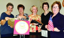 Pictured (left to right) Bonnie Clark, Barbara Hugus, Carolyn Hawkins, Jude Mente and Jan Hood with DAR 125 logo and symbols of history, education and patriotism.