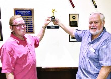 Willie “The Wizard” Foster, Tournament Chairman, IronOaks, receiving the traveling trophy previously held by Mission Royale League from Conrad Lienes, Tournament Chair. Photo by David “The Godfather” Mork.