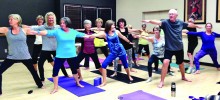 Practitioners in a Tuesday class.