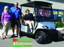Colette McNally, President Sun Lakes Women’s Association, Randy Peterson, General Manager A-1 Golf Carts and Susan Carew, winner.