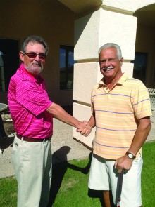 Lloyd Schaffer (left) congratulates John Gaudioso