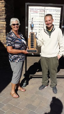 Mary is pictured with Sean Decker for trophy presentation.