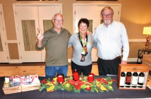 The three door prize winners from left to right are Jim Johnson, Ann Testa and Rich Greffes.